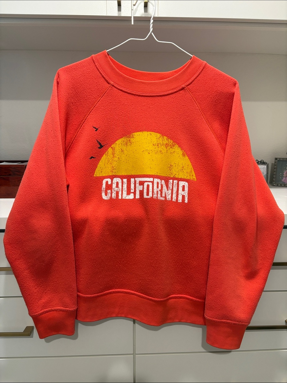 Rebecca Minkoff Red Crewneck with Yellow Sun Graphic